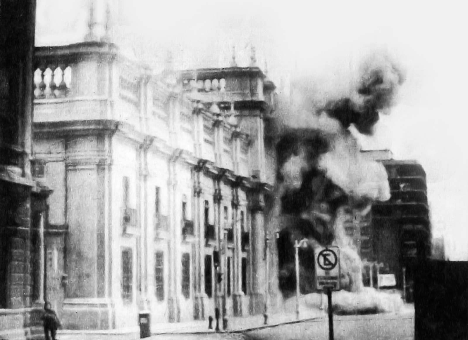 La Moneda presidential palace in Santiago de Chile under aerial bombardment by Hawker Hunter jets, September 11, 1973. Smoke rises from the central wing.
