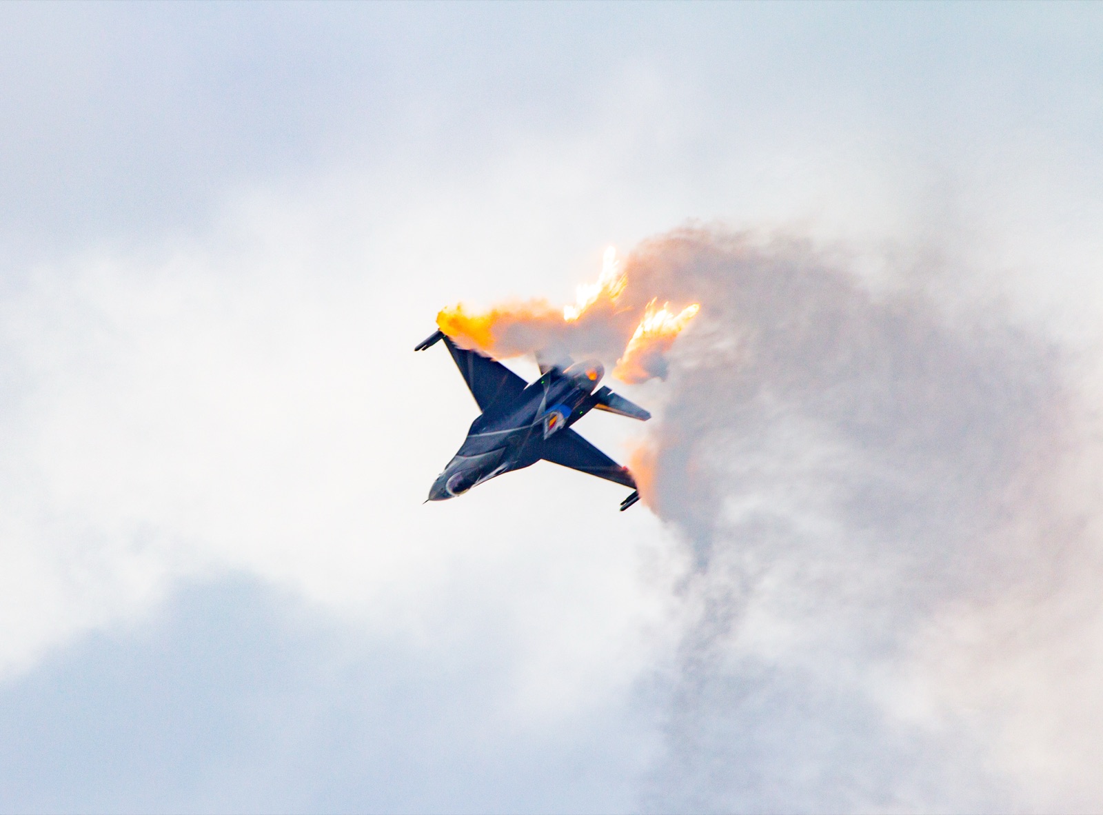 A Belgian Air Force General Dynamics F-16 fighter jet in flight.