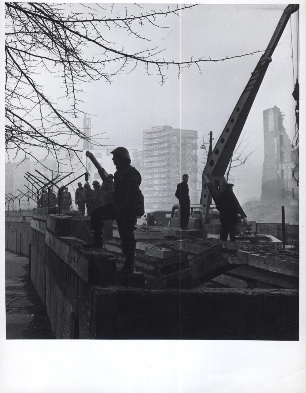 An East German soldier standing guard at the border in Berlin in the early 1960s.