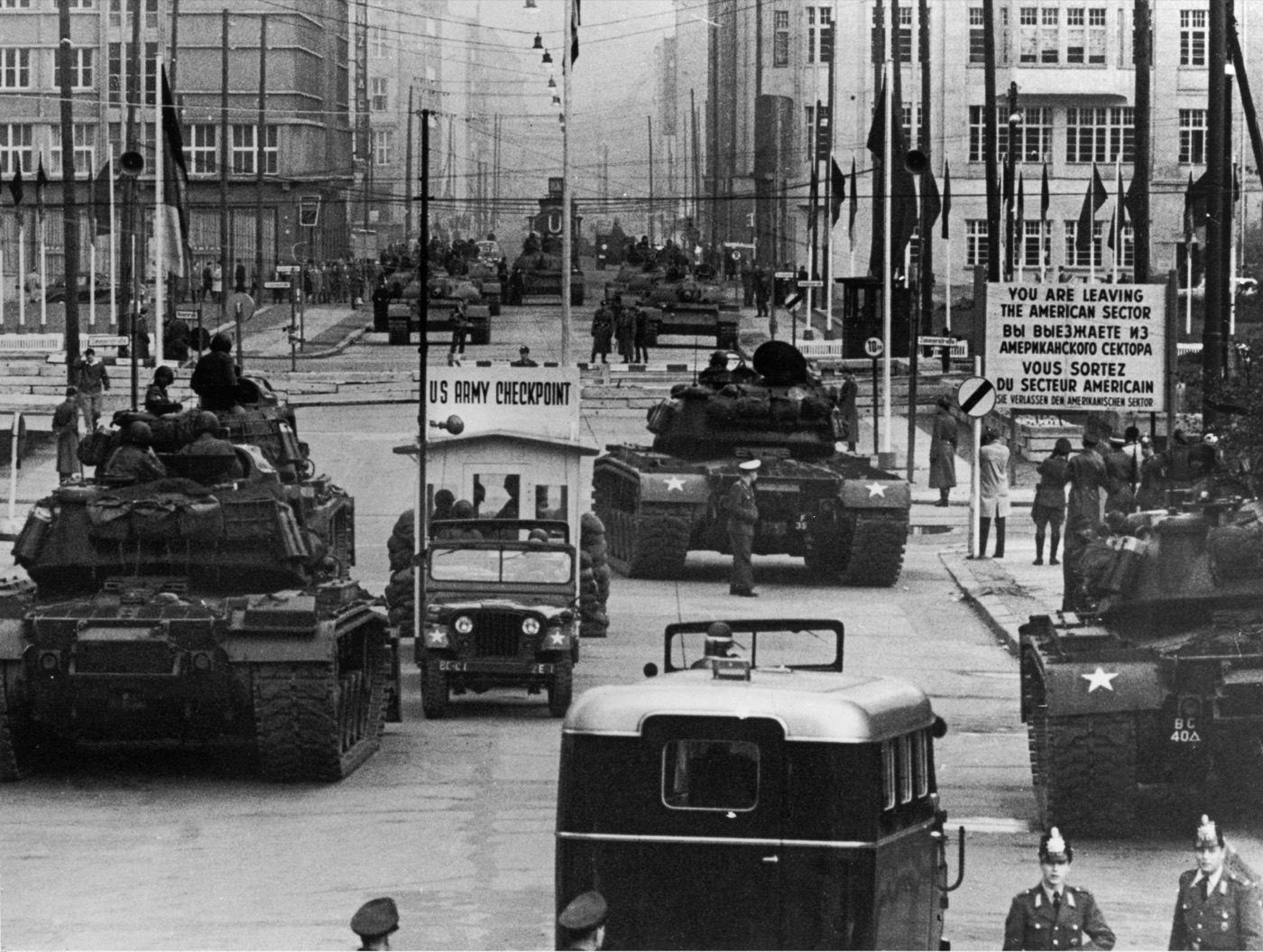 American and Soviet tanks facing each other across the border at Checkpoint Charlie in Berlin in 1961.