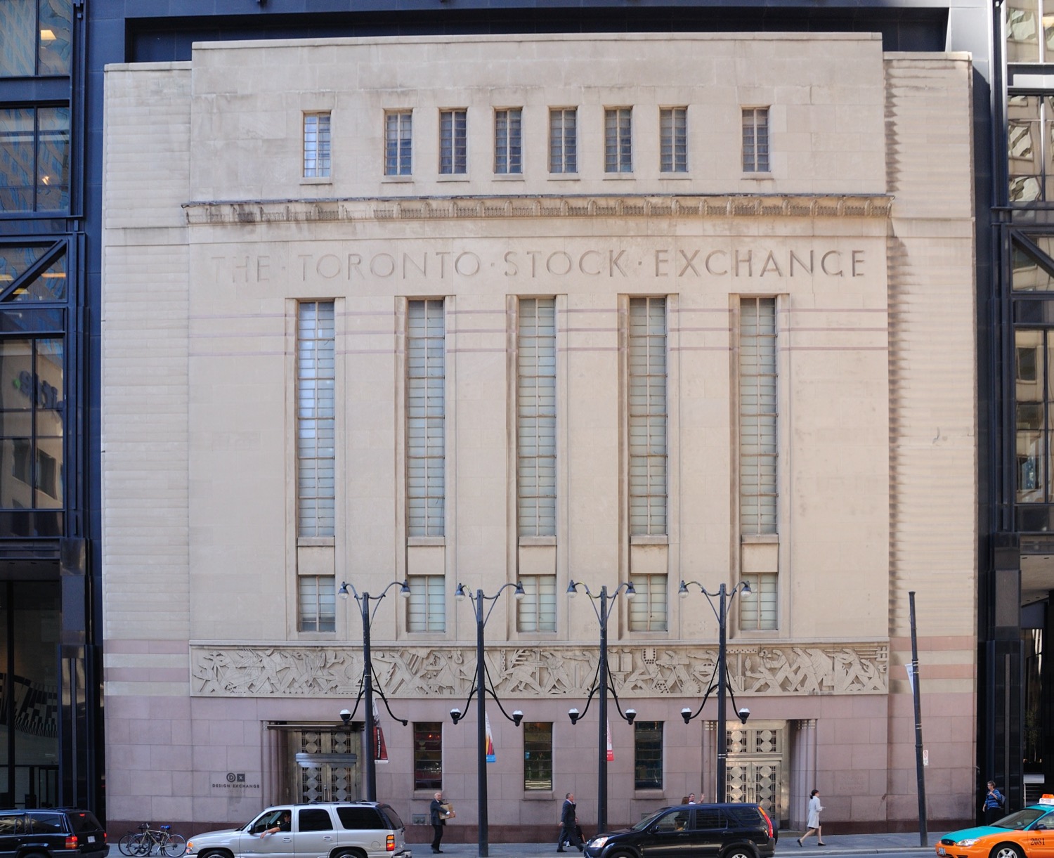 The Toronto Stock Exchange building in Canada, a modern facade with the TSX name.