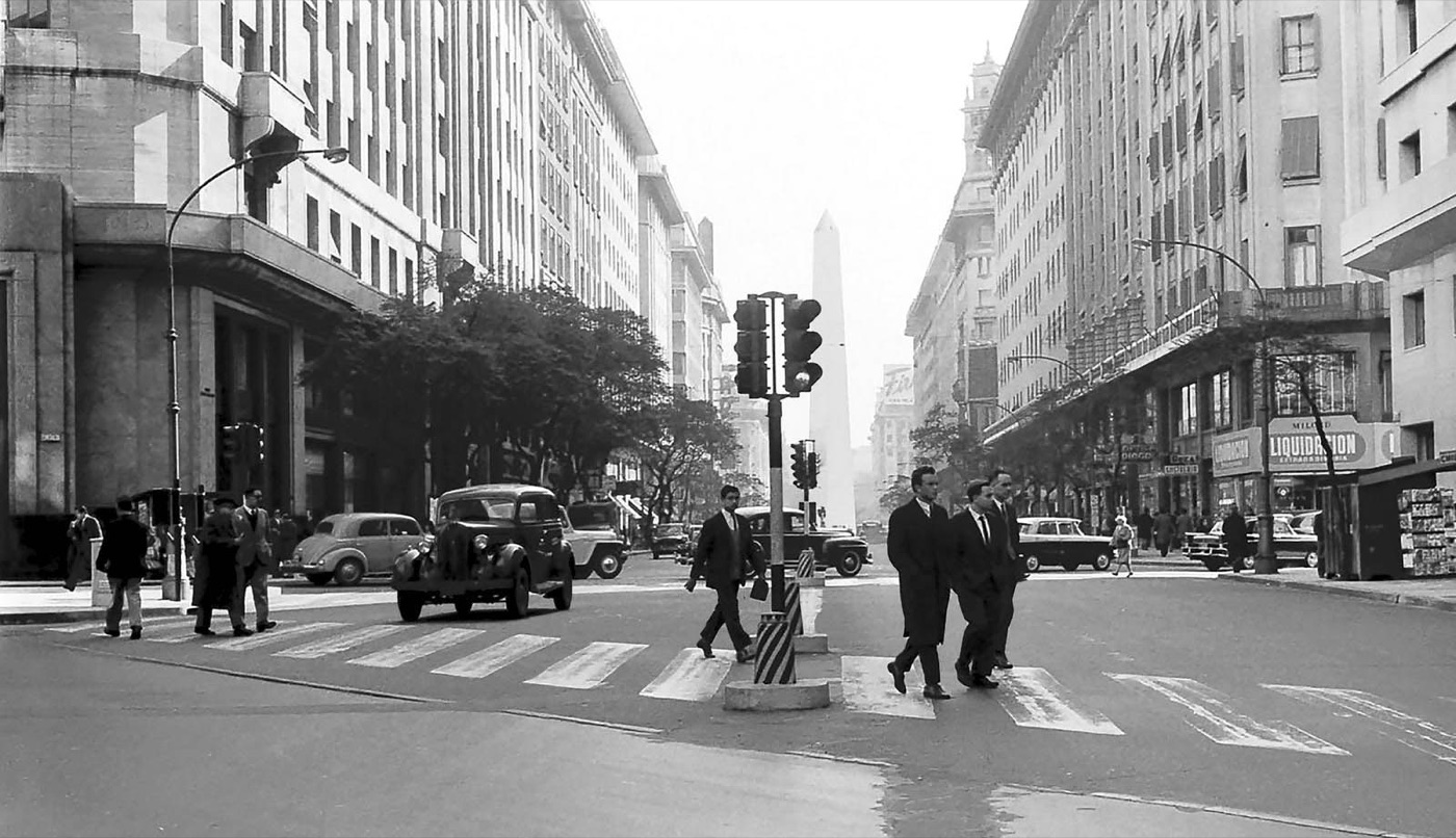 A street scene in Buenos Aires, Argentina, in 1960, with period cars and buildings.