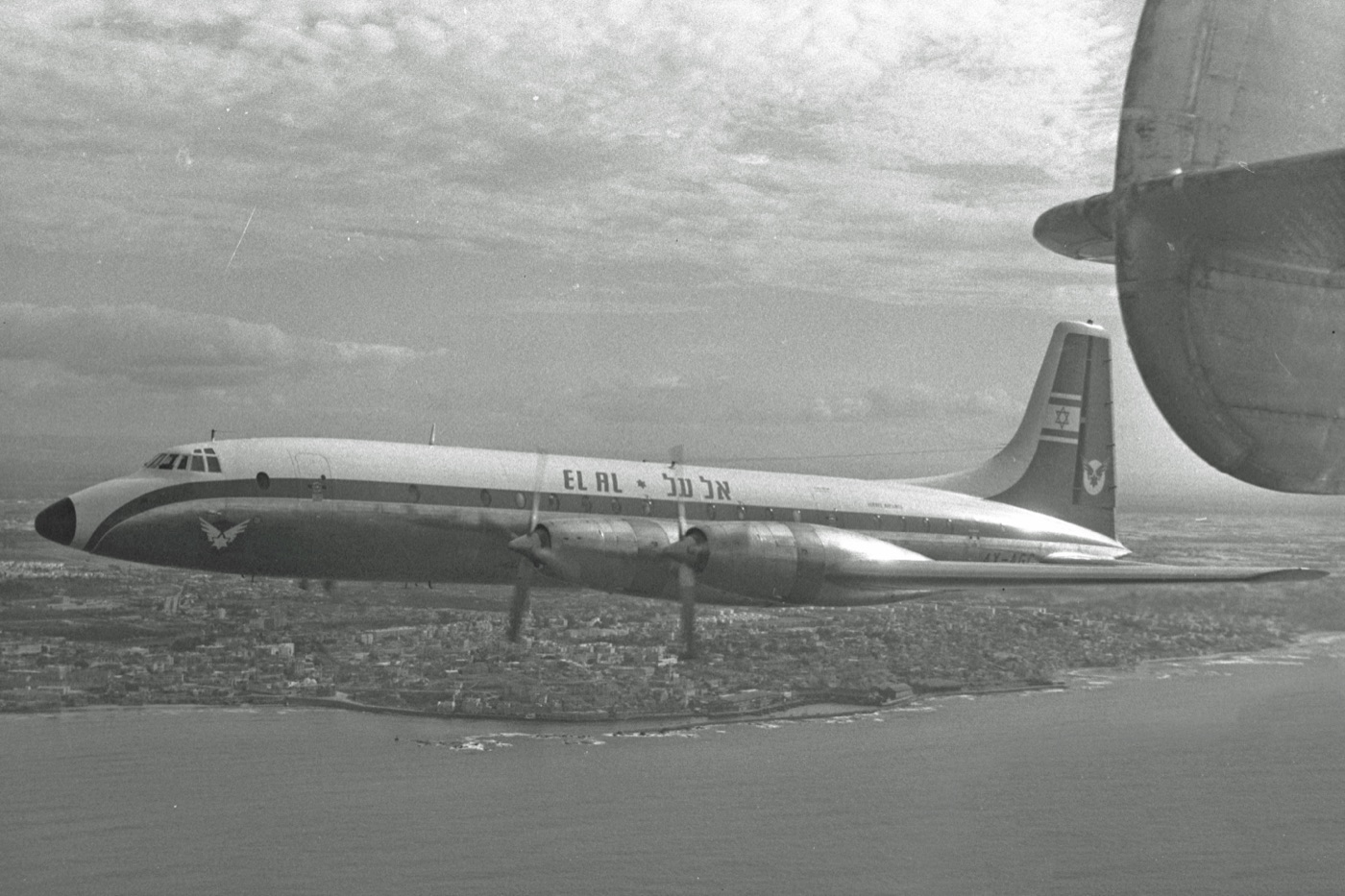 An El Al Bristol Britannia airliner of the type used in 1960, flying over Tel Aviv.
