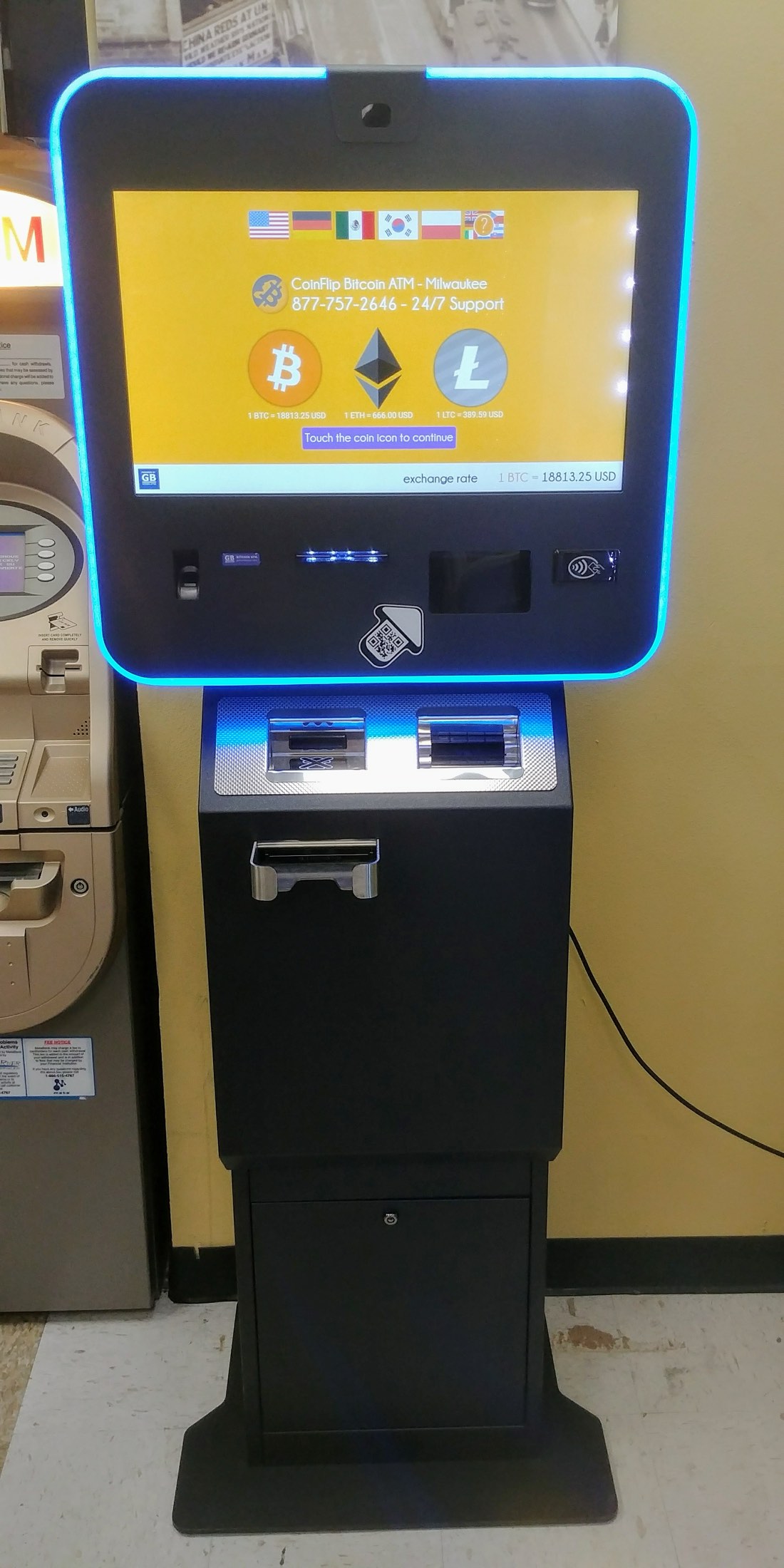 A cryptocurrency ATM machine in a shop, allowing people to buy crypto with cash.