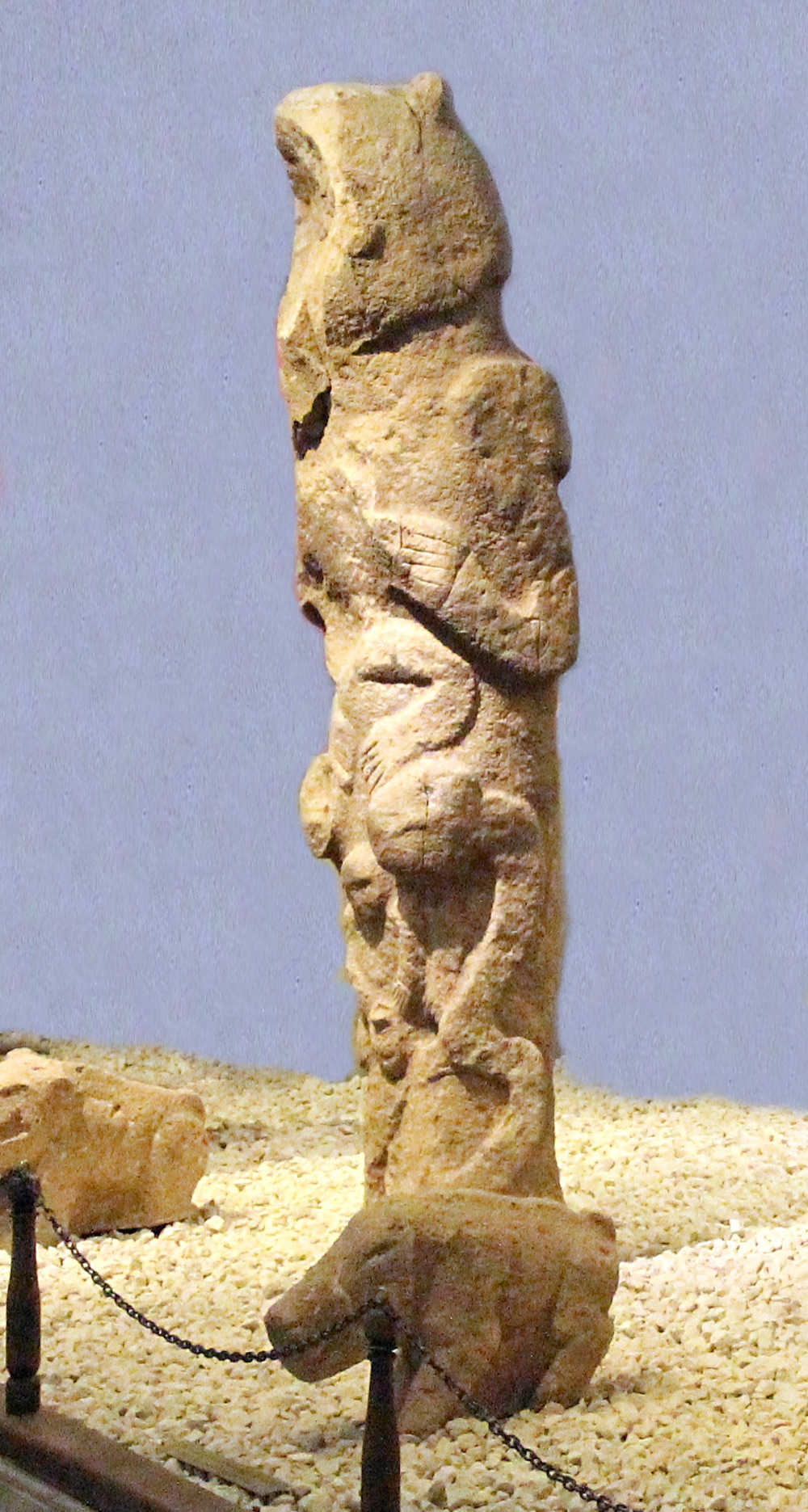 A carved stone totem-like sculpture from Göbekli Tepe on display in the Şanlıurfa Museum.