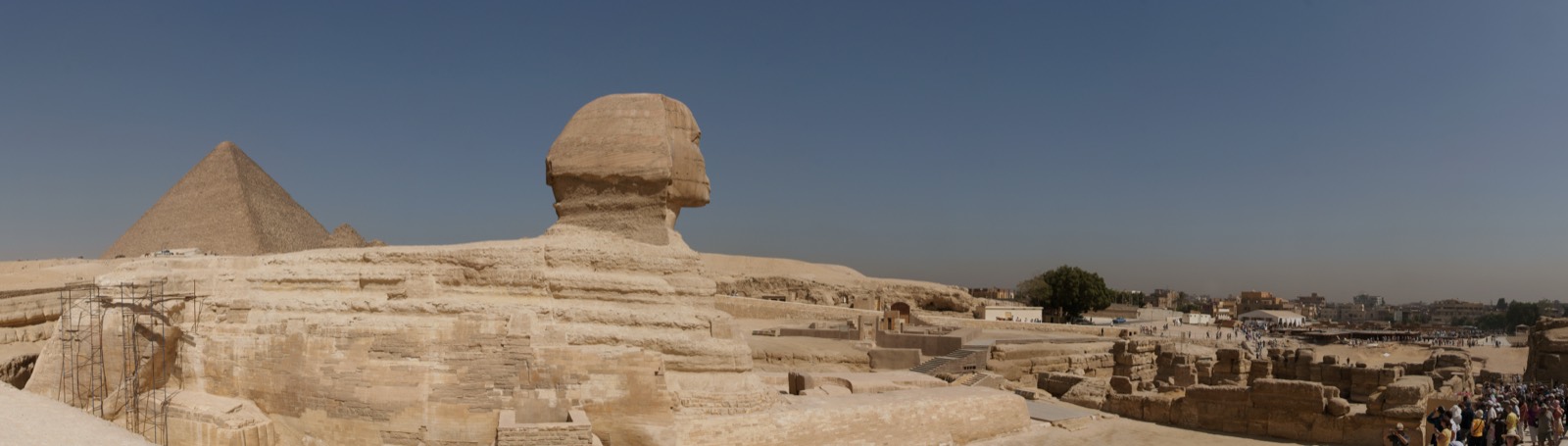 The Great Sphinx of Giza in the foreground with the Great Pyramid rising behind it.