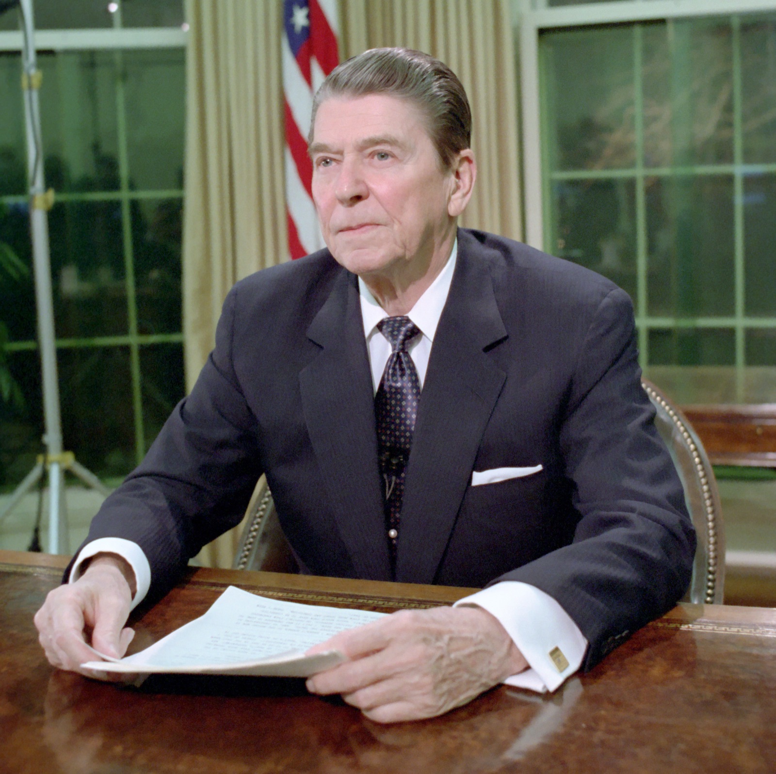 President Reagan addresses the nation from the Oval Office on the Iran-Contra controversy.
