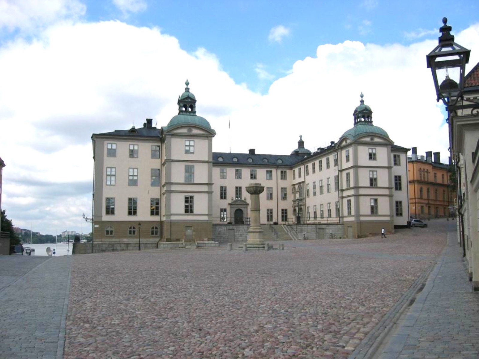 The Wrangel Palace on Riddarholmen in Stockholm, a historic stone building that houses the Svea Court of Appeal, seen across the water.