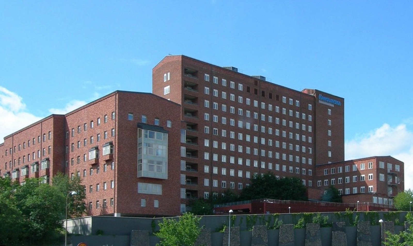 The main entrance of the Karolinska University Hospital, a large mid-twentieth-century hospital building in Stockholm.