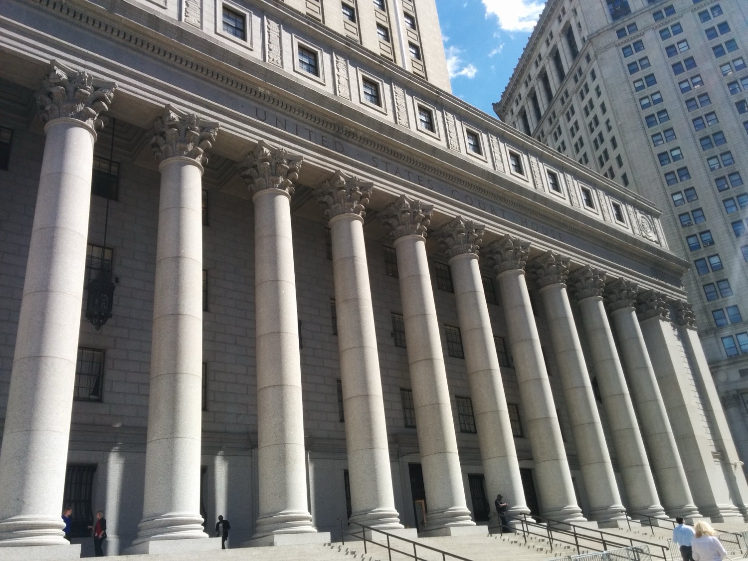 The Thurgood Marshall United States Courthouse in Manhattan, a grand classical building with columns.