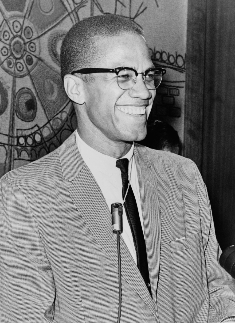 A portrait photograph of Malcolm X.
