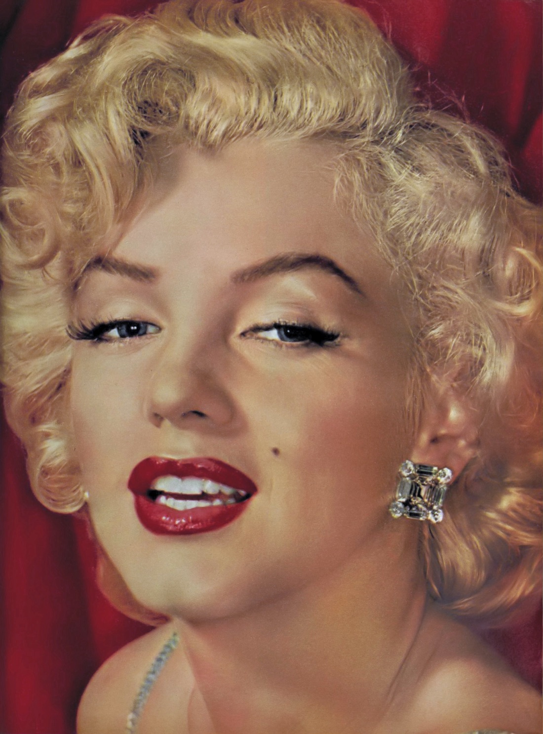 A color portrait photograph of Marilyn Monroe.