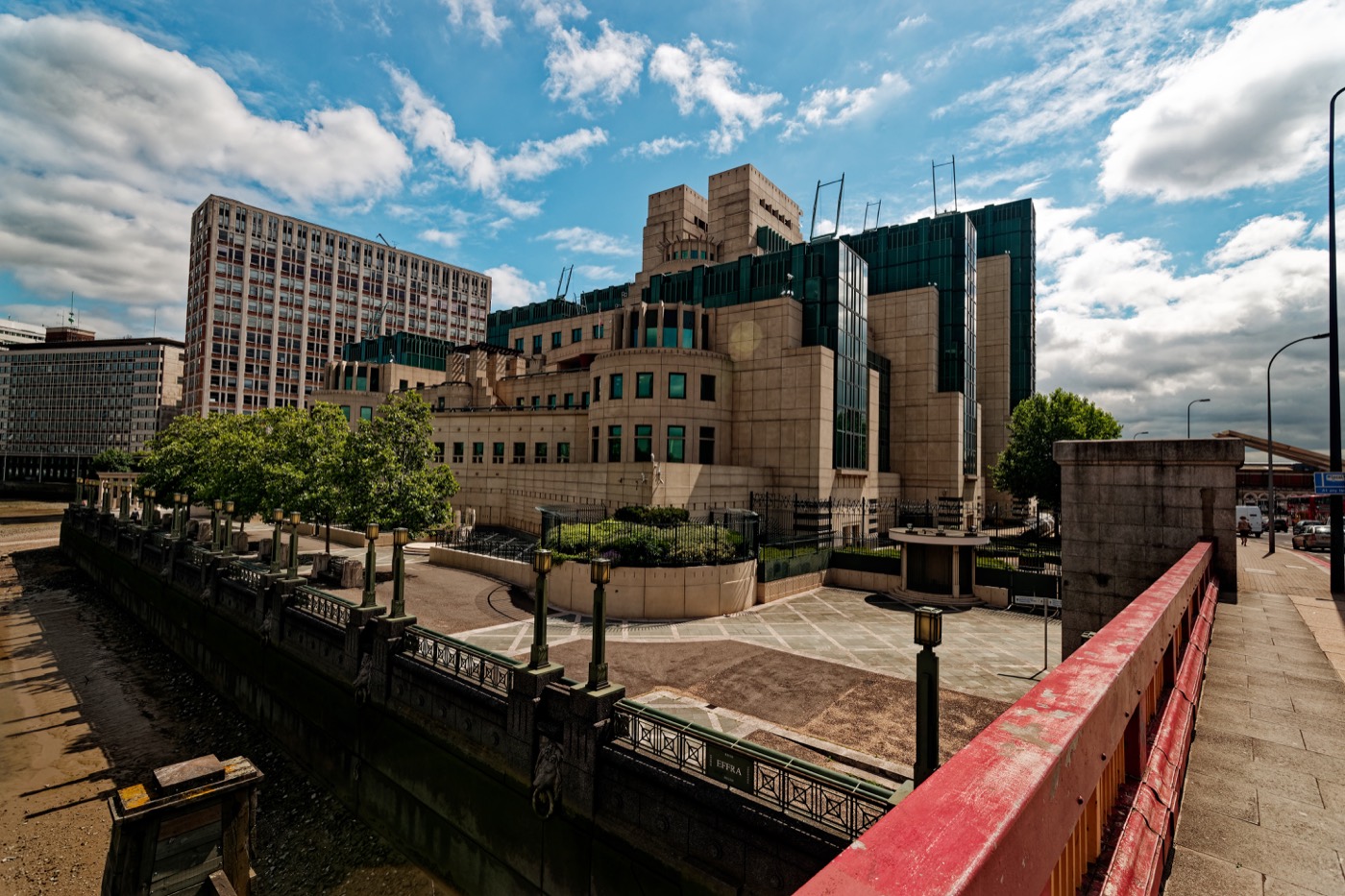 The MI6 building at Vauxhall Cross in London, a distinctive postmodern structure beside the Thames.