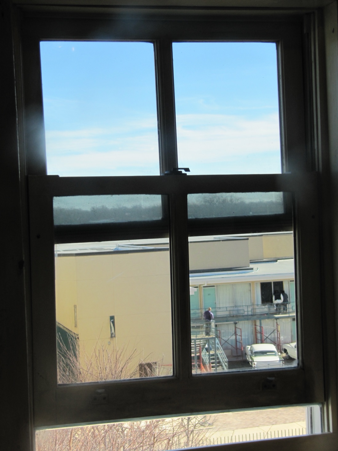 The view of the Lorraine Motel balcony from the rooming-house window from which the fatal shot is said to have been fired.