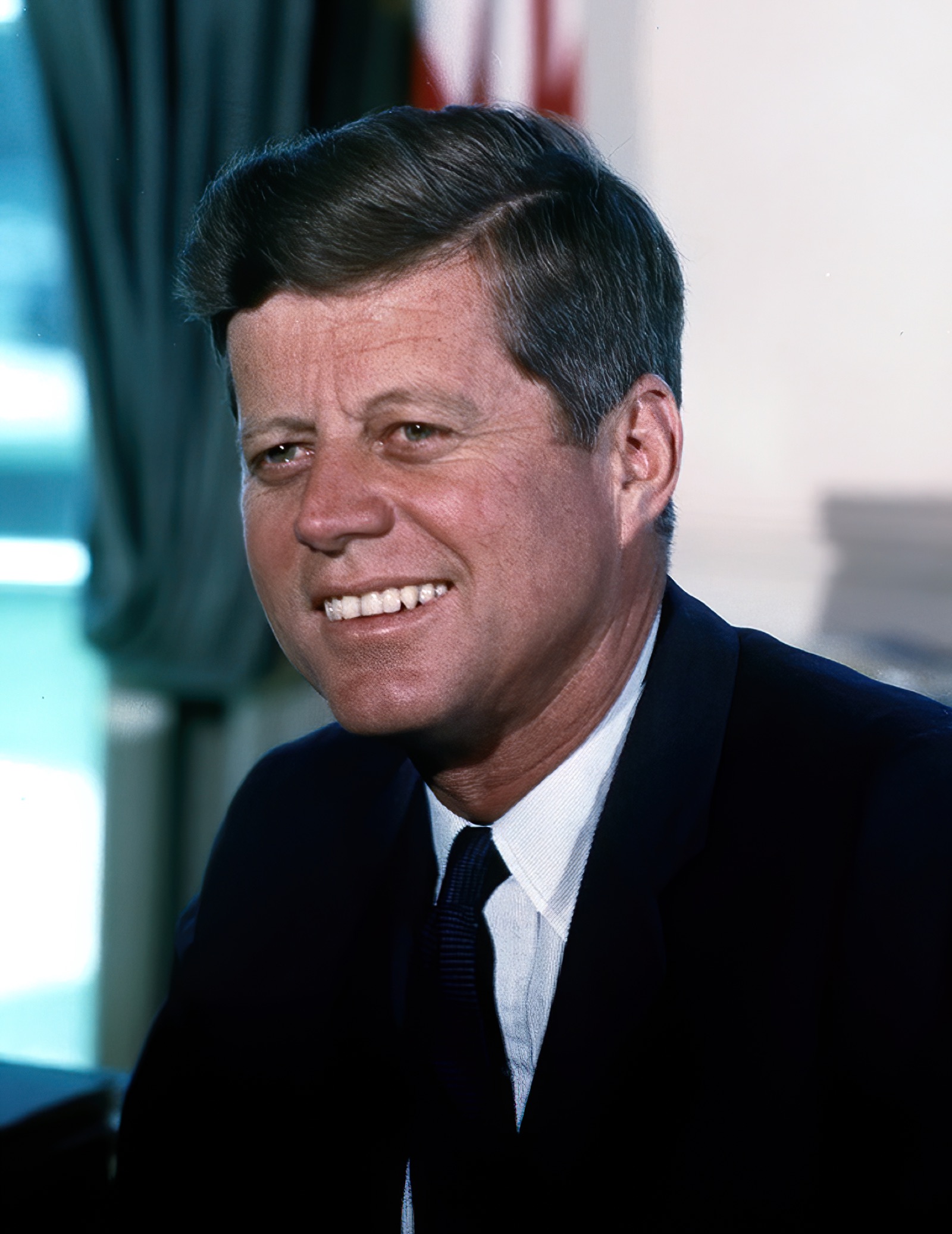President John F. Kennedy in the Oval Office.