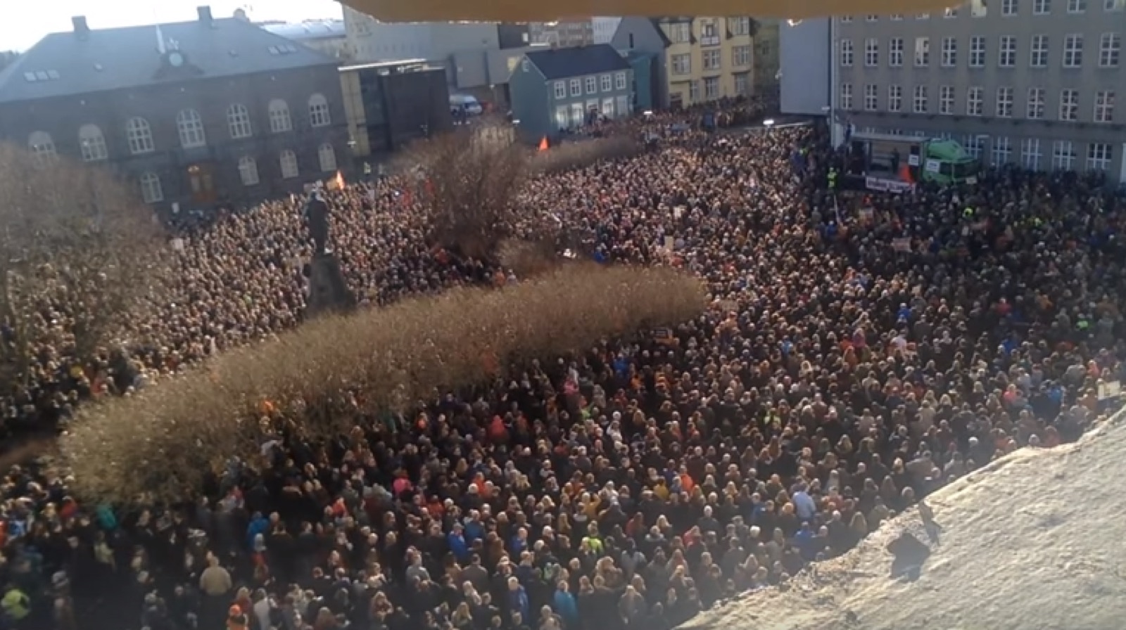 A crowd of Icelandic citizens gathered in front of the Althingi parliament building in Reykjavík on April 4, 2016, with signs demanding the Prime Minister's resignation.