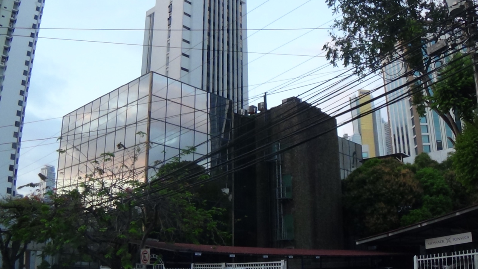 The Mossack Fonseca headquarters building in Panama City — a modern concrete-and-glass office building of approximately five storeys, photographed from the street.