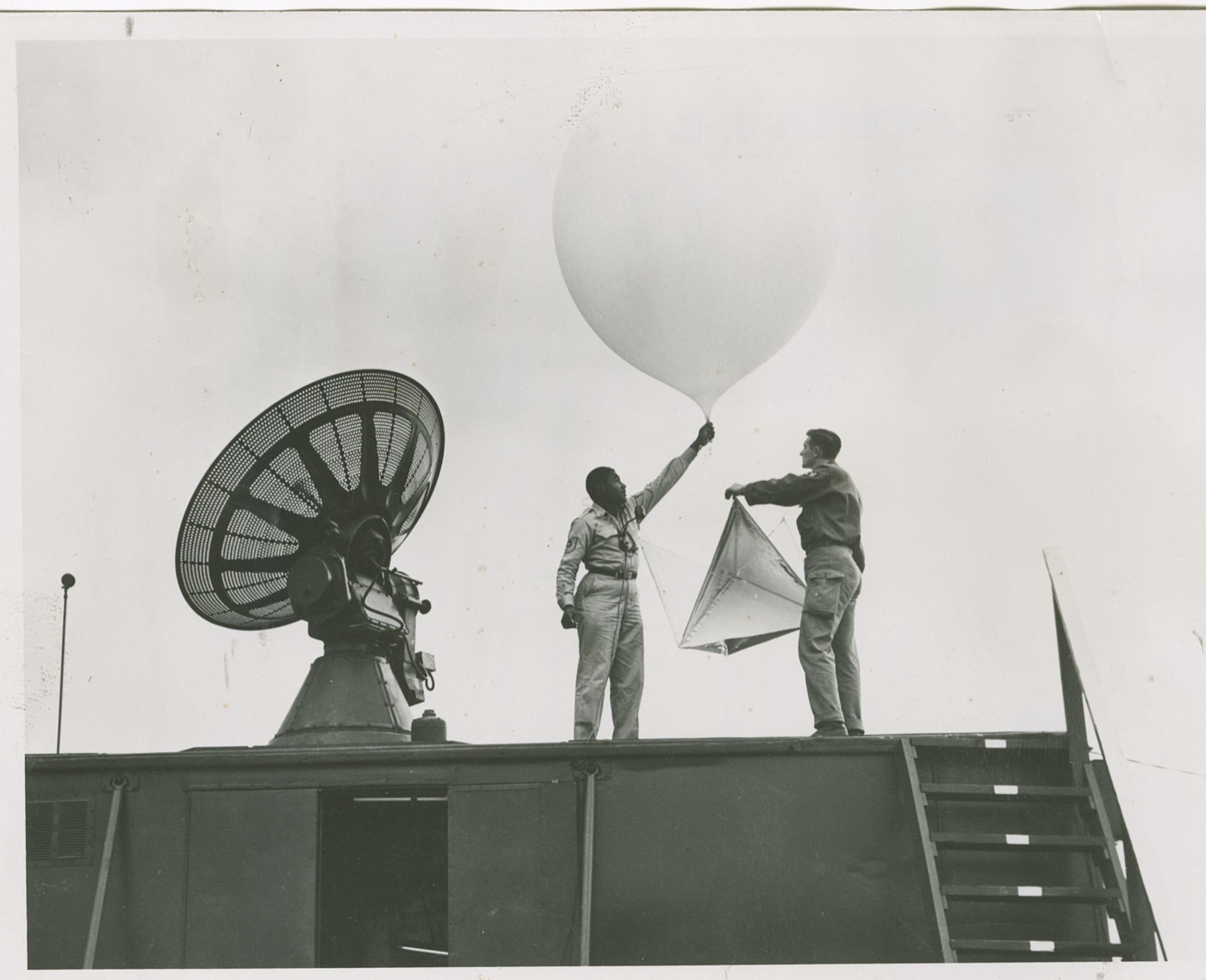 A weather balloon being launched, of the kind that accounted for many UFO reports.