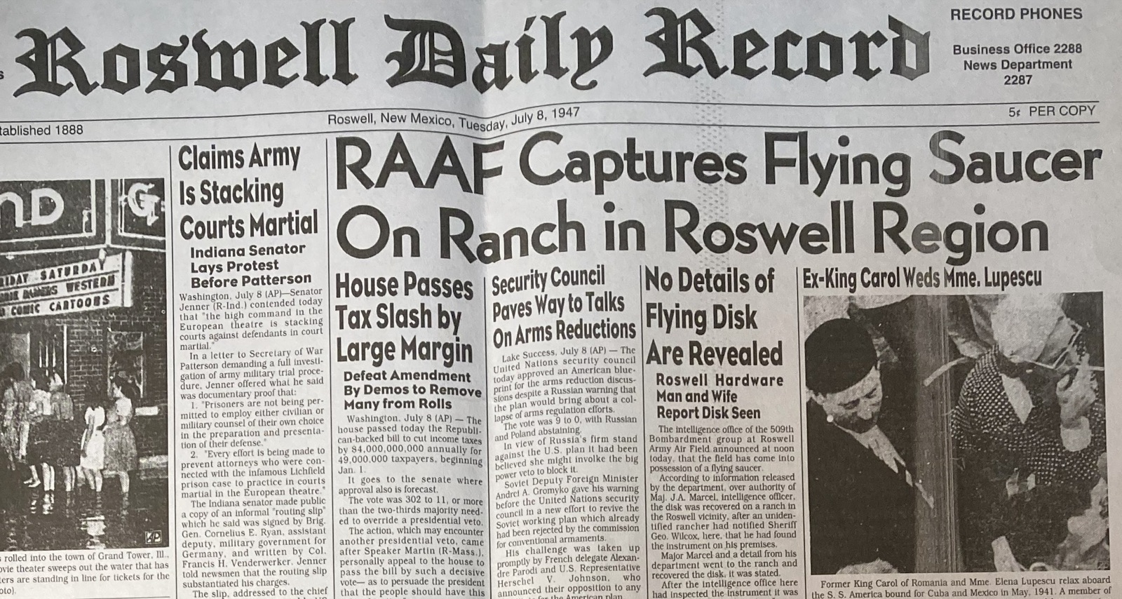 The front page of the Roswell Daily Record, July 8, 1947. The top headline reads 'RAAF Captures Flying Saucer On Ranch in Roswell Region.' Below it are smaller stories about a missing telephone operator and a Texas news roundup.