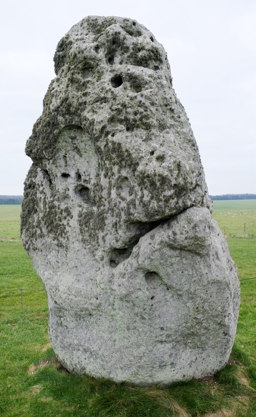The Heel Stone, a large unshaped standing stone outside the main circle of Stonehenge, marking the solstice axis.